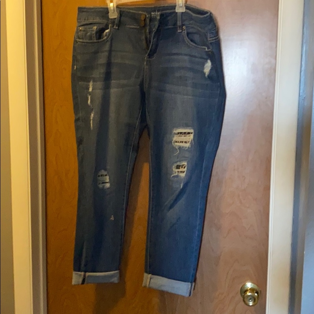 New York & Co. ripped jeans with leopard underlay